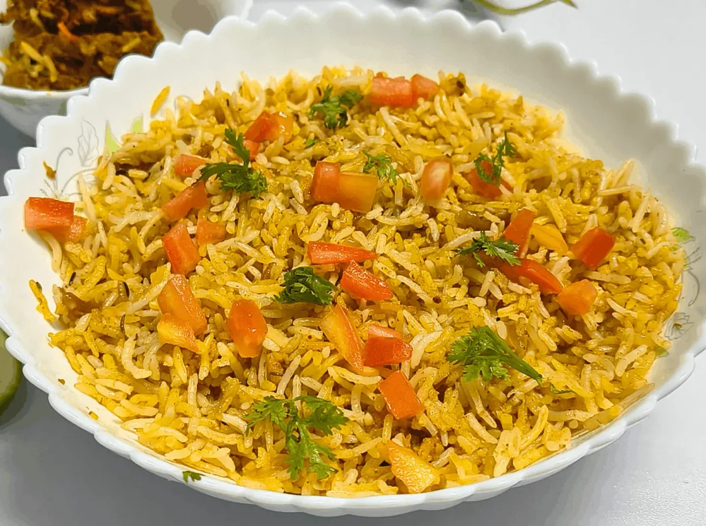 Close-up texture of Cava Saffron Basmati Rice with tomato garnish