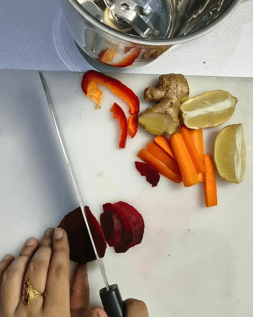 Scrubbing and chopping fresh beets step by step before making beet ginger juice