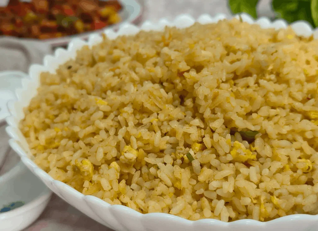 Close-up of Cava brown rice variation with scrambled egg and green and red pepper pieces