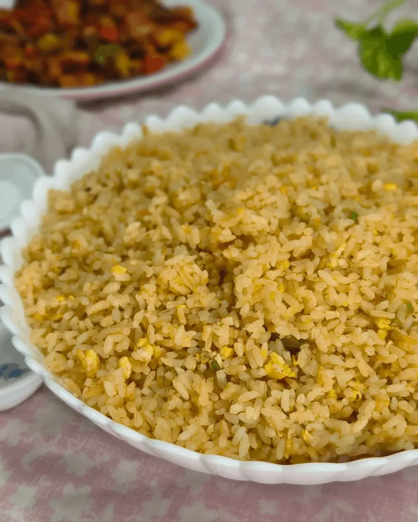 Side view of egg fried brown rice, a Cava brown rice variation, served in a white bowl