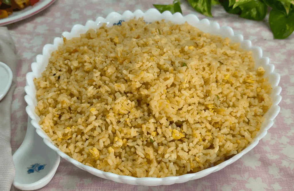 Cava brown rice variation: egg fried brown rice in a white scalloped bowl